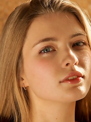Sigrid brightens up the whole room as she plays centerpiece with her sweet, endearing looks and youthful, tender body sprawled invitingly on top of th