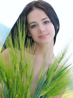 "A sensual, arousing striptease in the open by the sultry, sexy Leona with curvy body, huge labia, and magnificent perky tits."