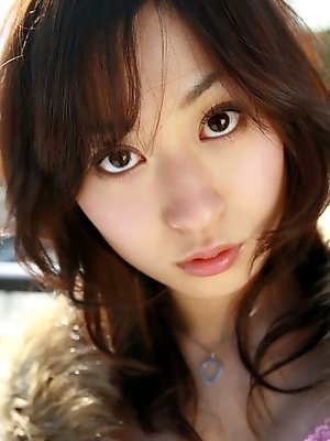 Asian teen model has a nice round ass and hot tits to go with it
